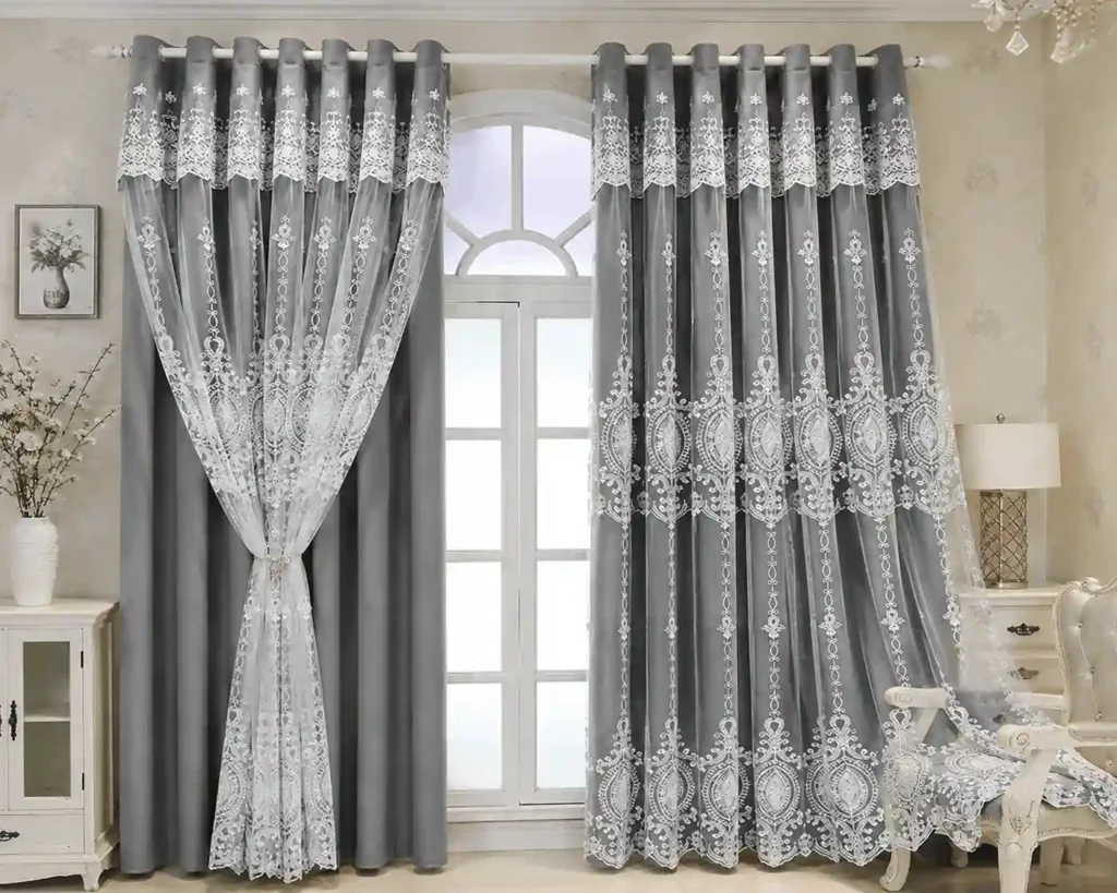 Custom sheer curtains in Riyadh with elegant embroidery and layered window treatment design.