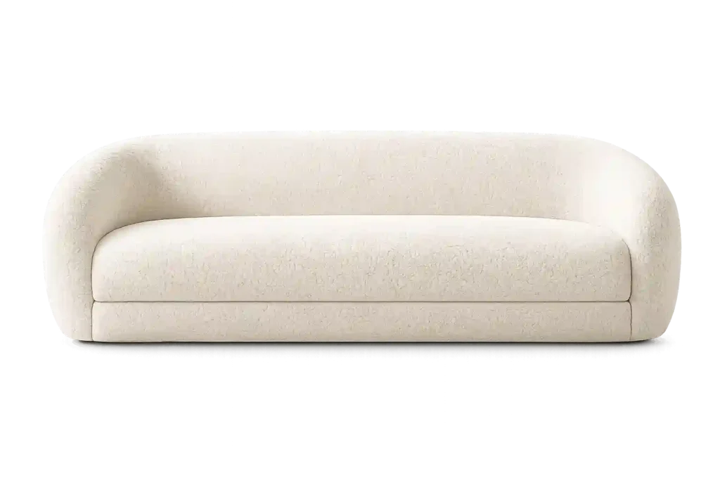 Modern rounded beige sofa set in Riyadh homes.