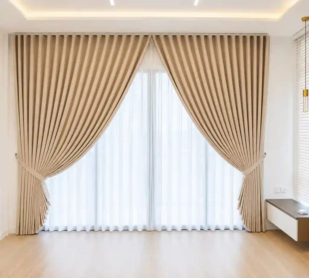 Beige pleated curtains for elegant living room interiors.