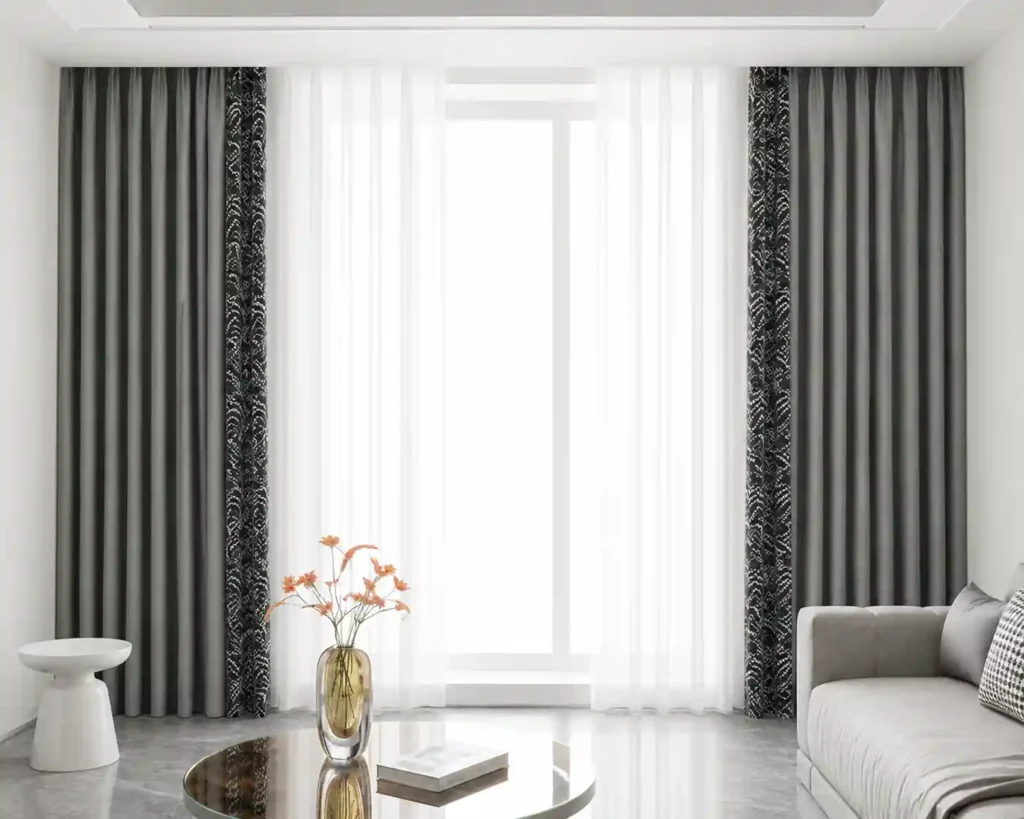 Grey curtain set with sheer center panel.