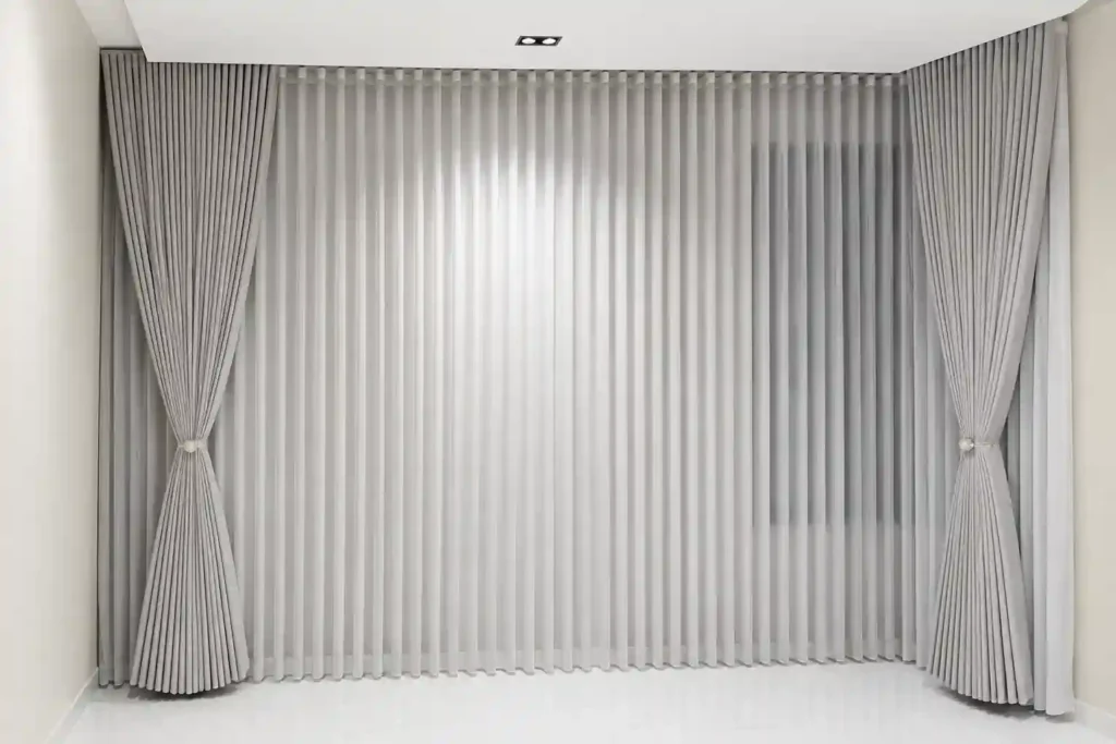Modern sheer curtains with elegant side drapes installed for residential and commercial spaces by trusted curtain companies in Saudi Arabia.