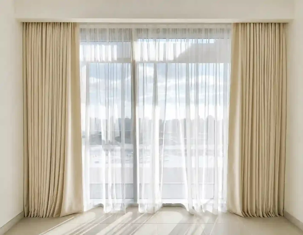 Beige luxury curtains from a curtain store in Saudi Arabia.